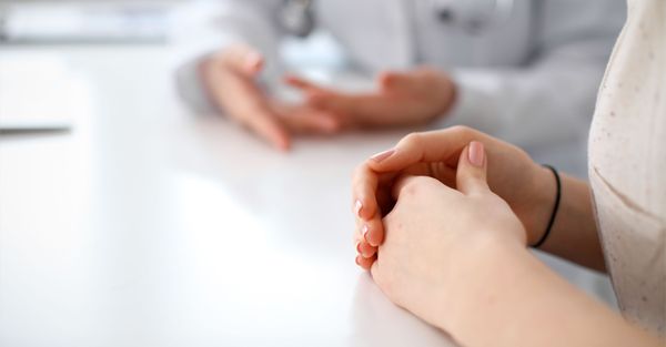 doctor speaking to a patient