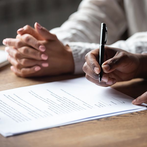 people filling out paperwork